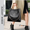 Bag | UrbanEase Shoulder Bag with Multiple Compartments, black color, woman walks along the sidewalk holding an UrbanEase. HIGHLIGHT THE FASHION, ELEGANT WOMAN, vibe houses