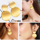 Earrings; Four images in one, Golden double disc earrings, Semijoias; Three women with their hair pulled back wearing the Wonderful Earring; Vibe Houses