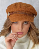 Cap BelleMar Sailor Beret, worn on a woman's head. Brown color, vibe houses