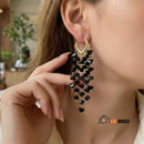 Earrings with black crystal tassel pendant ✨ Woman wearing the earrings; vibe houses