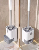 Toilet brush with long handle and drain base. Image of a bathroom showing two toilet brushes and two drain bases installed on the wall; vibe houses