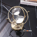 Hourglass Nordic Decoration Sand Retro; On a black table, photograph with top-down angle; vibe houses