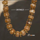 Necklace | Terra Gold - Brown Coffee color. One piece of the necklace is on display. Enlarged image. Details; vibe houses