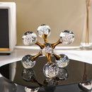 Molecular Crystal Ball.  On top of a tray that in turn is on the table. Vibe Houses