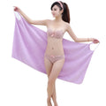 Towel Bath towel with wearable handle for women; The model is standing and wearing a purple towel; Order now! vibe houses