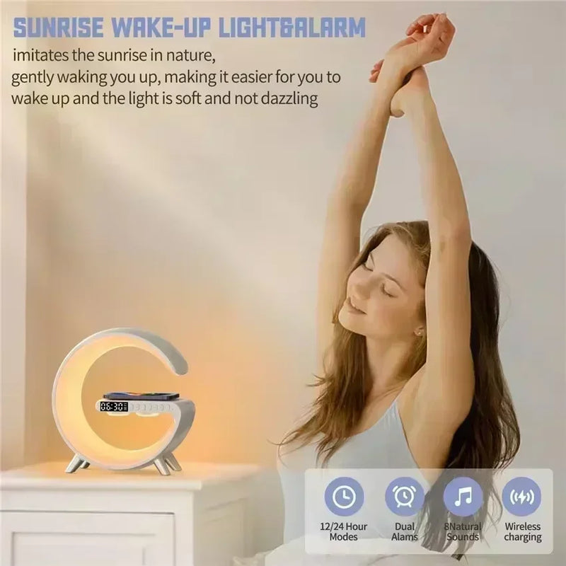 Alarm clock, Image of a young woman stretching in the morning, the fraze in the image is; Sunrise wake-up light-alarm; imitates the sunrise in nature, gently waking you up, making it easier for you to wake up and the light is soft and not dazzling; Vibe Houses