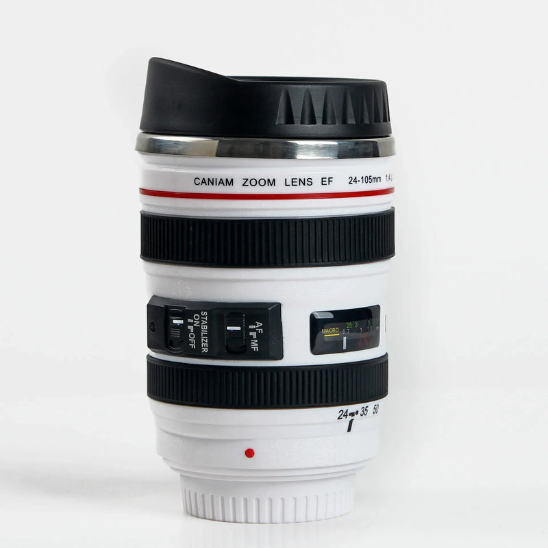 Stainless steel mug with camera lens;  mug is White; Vibe Houses