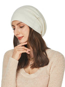 CozyMuse beanie; woman wears white beanie on her head; vibe houses