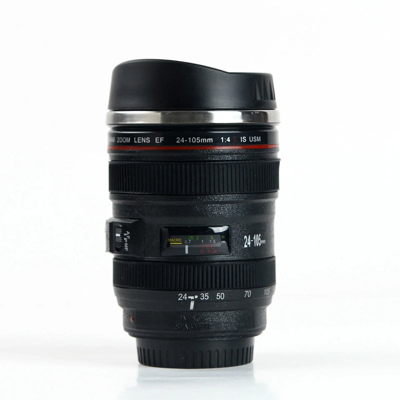 Stainless steel mug with camera lens; mug is Black; Vibe Houses