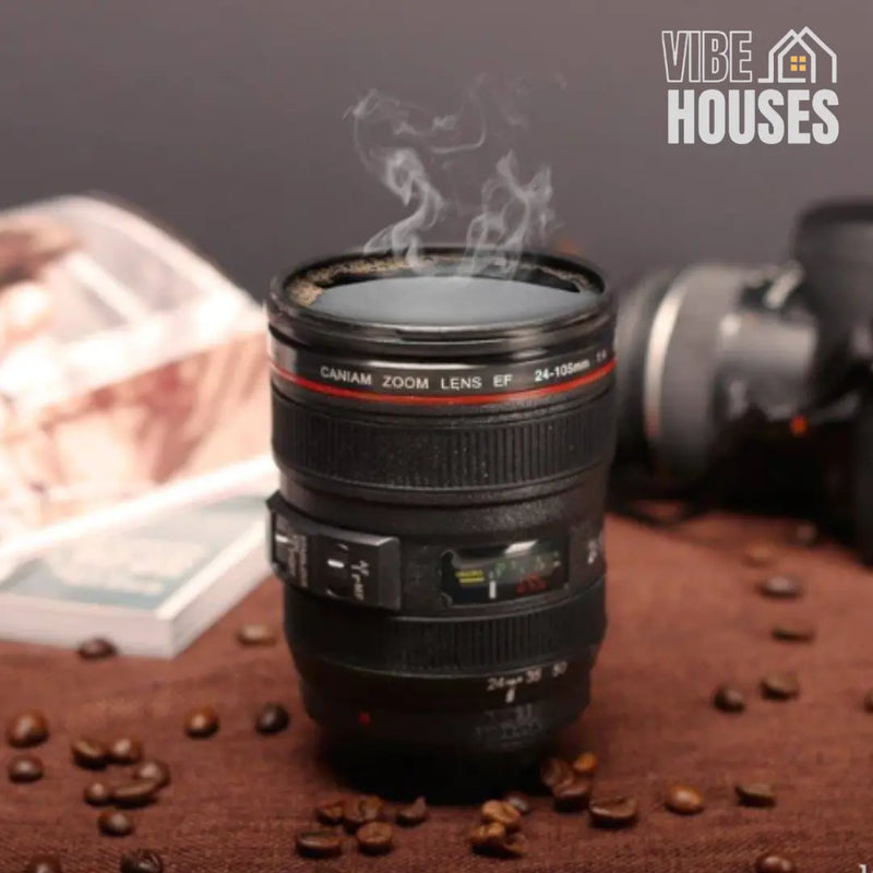 Stainless steel mug with camera lens! 📷A mug, black. Hot liquid in mug; CreatMug by Vibe Houses