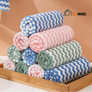  Towels - Ten beautiful towels in different colors. They are in a rectangular wooden tray. Vibe Houses