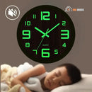 Luminous Wood Wall Clock - This is on the wall of a room. Where a child is in the place sleeping. Dark environment. Soft luminous glow on the hands and numbers. Silent clock. Size: 10.8 inches/27.5 cm diameter; Color: Wood. Order now and enjoy FREE shipping! Vibe Houses