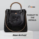 Shoulder bag - UrbanEase; black color; The bag is on a white table. Pursuit to the details. New arrival; vibe houses