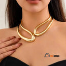 Choker necklace, woman poses for photo, she is wearing the Aurelia choker necklace around her neck; vibe houses
