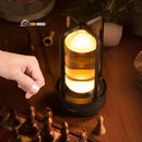 Modern lamp with LED light; the lamp is on a table and a hand extends towards it. Black model; Houses vibe 🚚 Limited stock